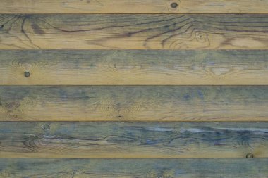 Ahşap duvarın dokusu. Ahşap bir tahtanın arka plan görüntüsü. Dış görünüş için doku. Dekorasyon tahtası. Evdeki iç dekorasyon. Metin için arka plan. Mesaj için yer var. Üst görünüm.