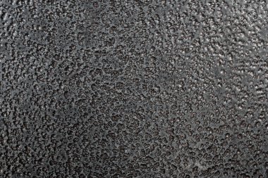 Detaylı metal kaplama dokusu. Aşınmaya dayanıklı kaplama. Soyut arkaplan. - Yakın çekim. Koyu renk. Arkaplan resmi. Mesaj için yer var. Masaüstü duvar kağıdı. Üst görünüm.