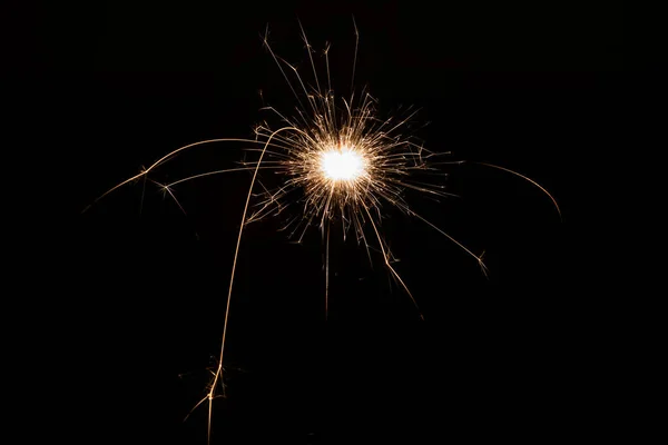 Burning sparkler, fireworks for holidays includes christmas, happy new year — Stock Photo, Image