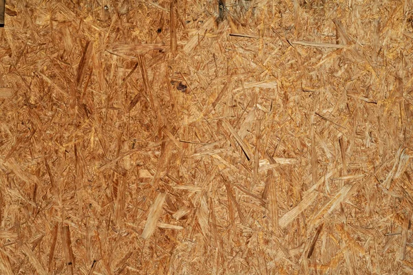 Oriented strand board invecchiato resistente alle intemperie grunge legno superficie piana te — Foto Stock
