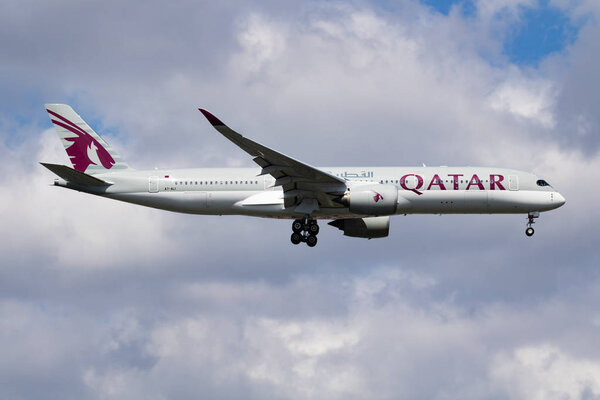 Qatar Airways Airbus A350-900 A7-ALI passenger plane arrival and landing at Istanbul Ataturk Airport