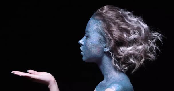 Profile Girl Blue Face Sparkles Closeup Black Wall Blows Sparkles — Video