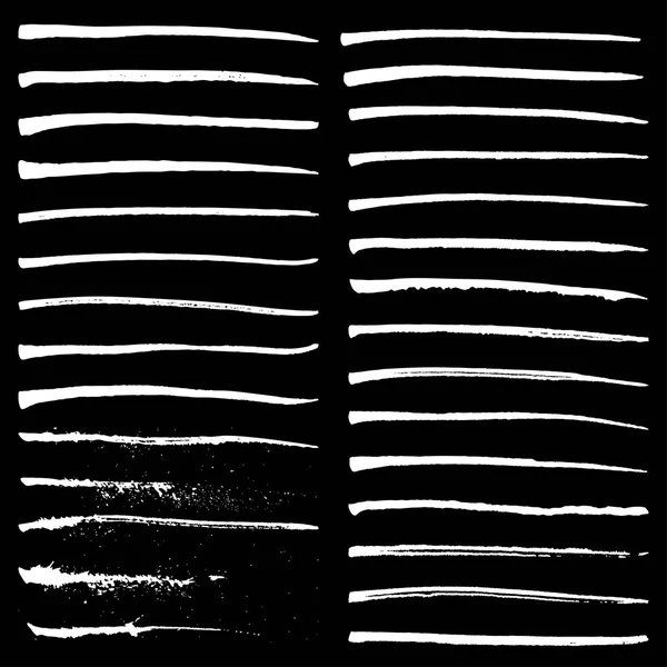 Satz weißer Tuschestriche auf schwarzem Hintergrund, Vektor illustratio — Stockvektor