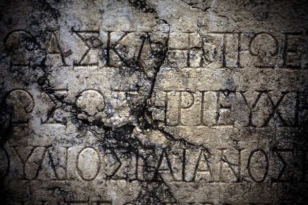 Alfabeter fra oldtidens Egypt om bakgrunnstekst i marmor – stockfoto