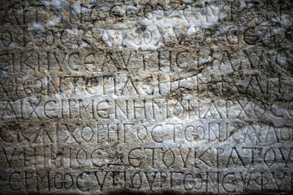Alfabeter fra oldtidens Egypt om bakgrunnstekst i marmor – stockfoto