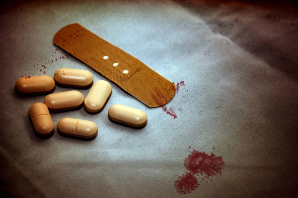 Band-aid and Medicine Pills — Stock Photo, Image