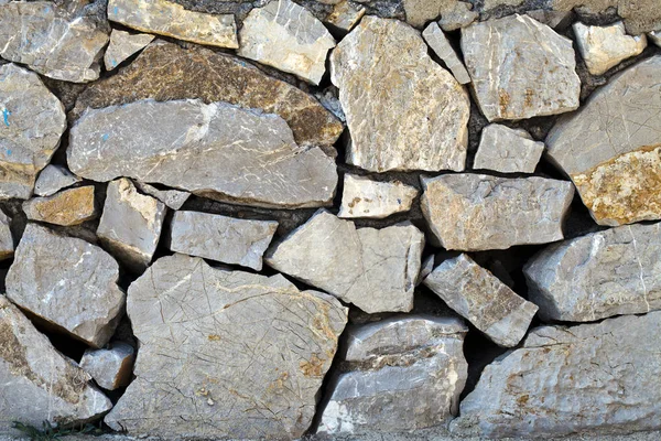 抽象的垃圾石头墙背景 — 图库照片
