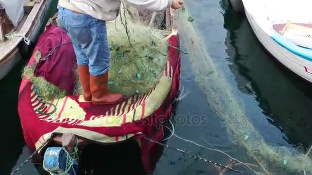 Fisherman Repairs Fishnet Fishing Lines — Stock Video