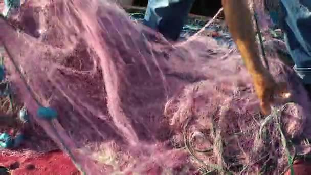 Pêcheur Réparations lignes de pêche résille 