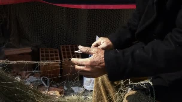 Fisherman Repairs Fishnet Fishing Lines — Stock Footage Fisherman Repairs Fishnet Fishing Lines Video Clip