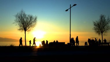 People Silhouette and Sunset and Sea
