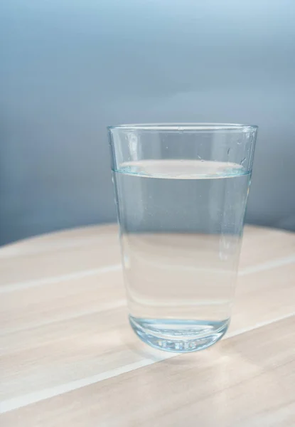 Water Glass On White Table With Blurred Background Kitchen Object Stock Photo Water Glass On White Table With Blurred Background Kitchen Object Stock Photo