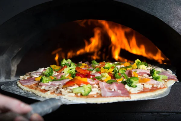 Man Makes Homemade Pizza Inserted Hot Slove Which Burning Wood — Stock Photo, Image