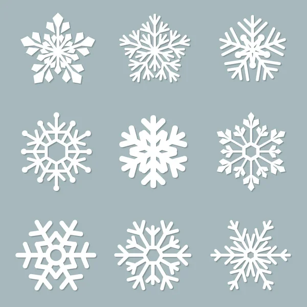 Conjunto de copos de nieve de papel vectorial — Vector de stock