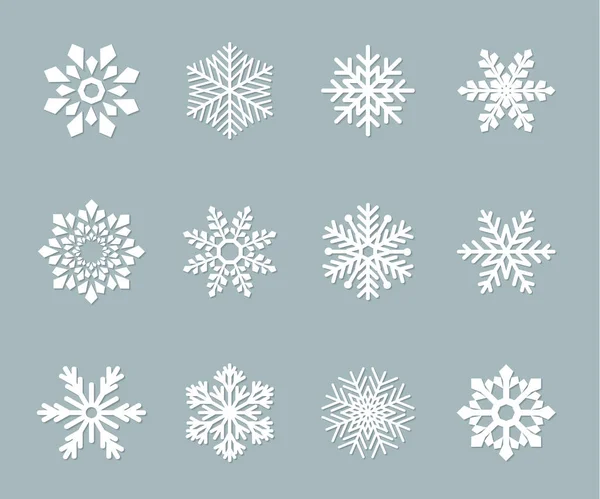 Conjunto de copos de nieve de papel vectorial — Vector de stock