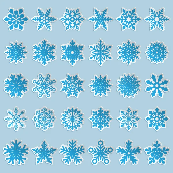 Conjunto de copos de nieve de papel vectorial — Vector de stock