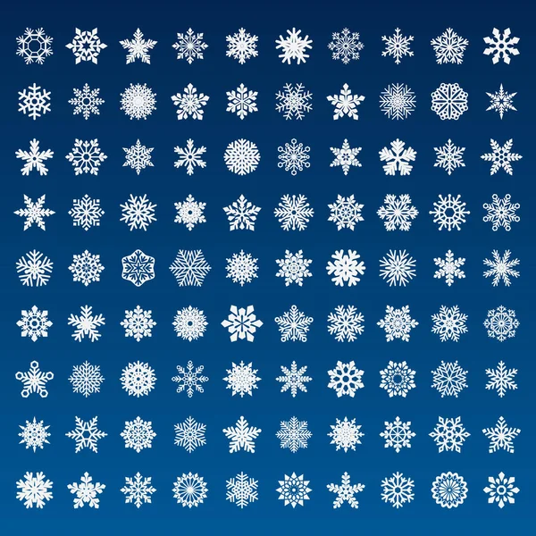 Conjunto de flocos de neve vetoriais no fundo azul — Vetor de Stock