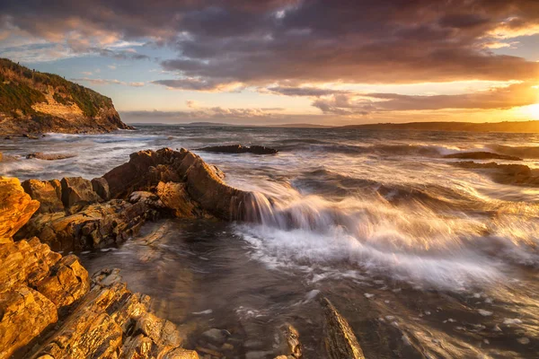 Západ slunce na Garretstown Beach Stock Obrázky