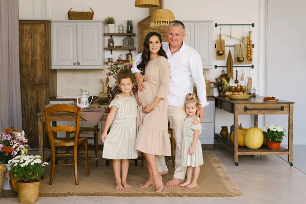 Beautiful Family Two Daughters Smiling Kitchen Pregnant Mom Holding Hands — Stock Photo, Image