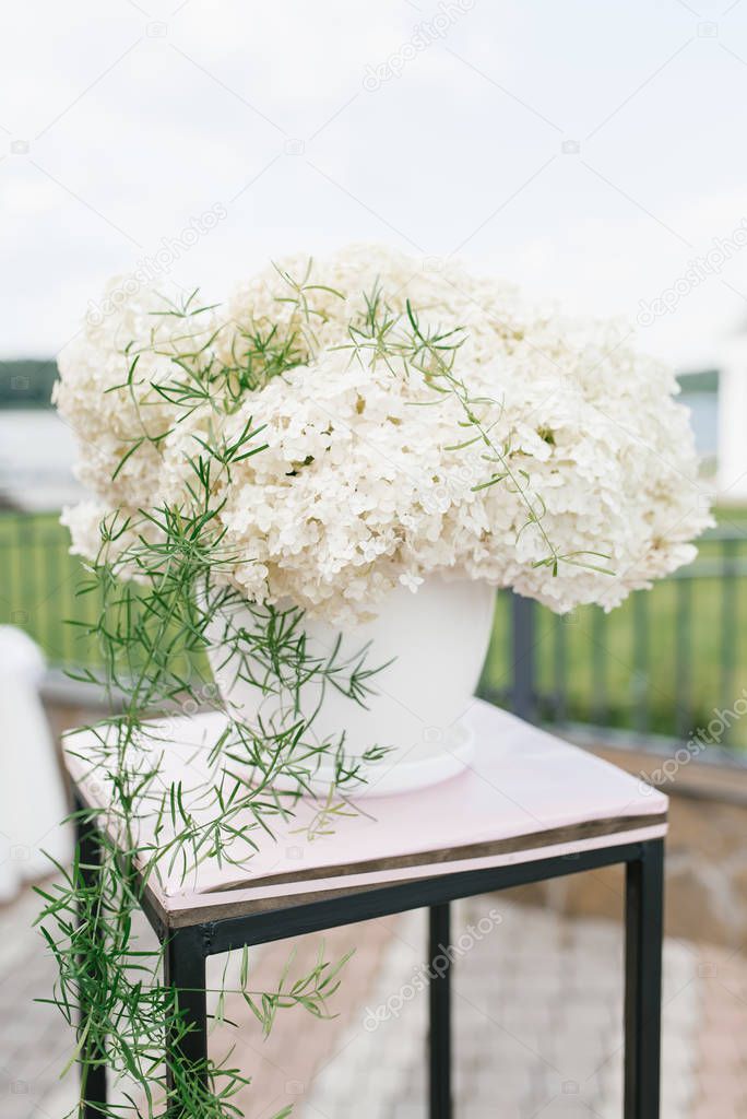 Composition of white hydrangea at the wedding, decor