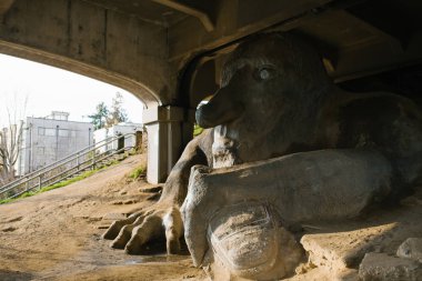 Seattle, USA. The November 2019. Fremont Troll under the bridge. Side view clipart