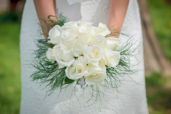 Delicate beautiful wedding bouquet of white roses and greenery i — Stockfoto