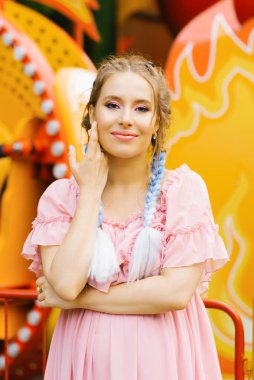 Professional bright makeup for a beautiful European woman in a p