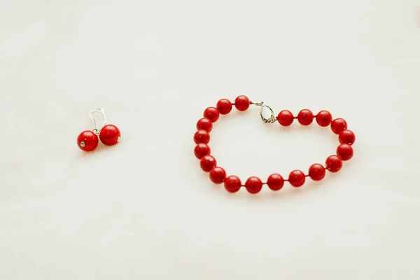 Red Jewelry Bracelet Earrings Beads White Background — Zdjęcie stockowe