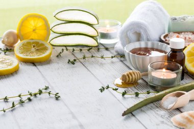 A close up view of a variety of holistic natural remedies used in alternative wellness therapies. clipart
