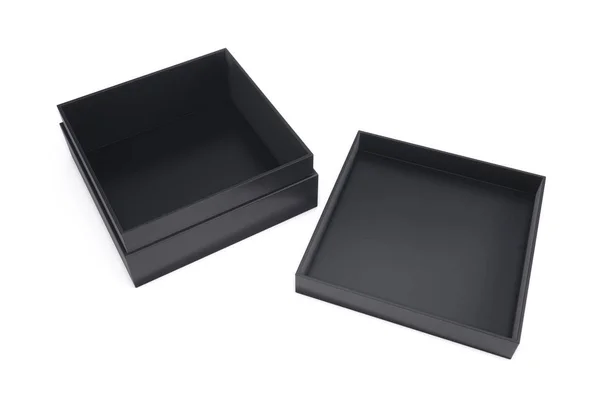 Άδειο το μαύρο κουτί με το παρακείμενο καπάκι σε λευκό φόντο. 3D — Φωτογραφία Αρχείου