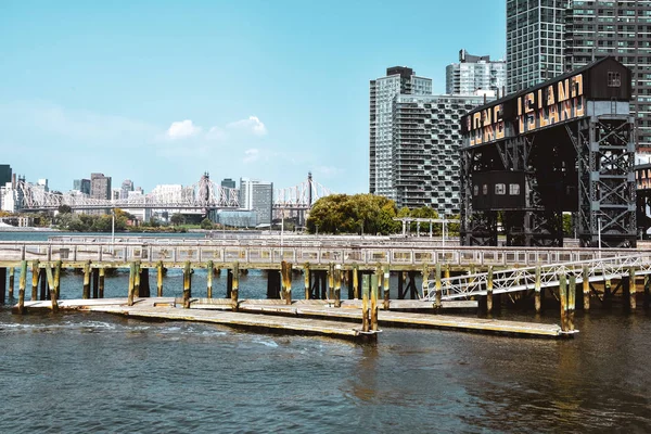 Ferry Dock at Long Island on a sunny day. Transportation and travel concept. Brooklyn, New York City, USA. — Stock Photo, Image