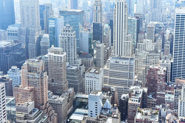 Aerial close up view of crowded buildings in New York City on a sunny day. Construction concept, crowded cities, and apartment rentals. NYC, USA — Stock Photo, Image