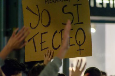 MADRID, SPAIN - MARCH 8, 2019: Massive feminist protest on 8M in favour of women's rights and equality in society. Protest posters could be seen during the demonstration, in Madrid, Spain on March 8, 