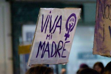 MADRID, SPAIN - MARCH 8, 2019: Massive feminist protest on 8M in favour of women's rights and equality in society. Protest posters could be seen during the demonstration, in Madrid, Spain on March 8, 
