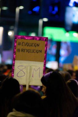 MADRID, SPAIN - MARCH 8, 2019: Massive feminist protest on 8M in favour of women's rights and equality in society. Protest posters could be seen during the demonstration, in Madrid, Spain on March 8, 2019