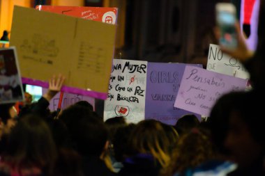 MADRID, SPAIN - MARCH 8, 2019: Massive feminist protest on 8M in favour of women's rights and equality in society. Protest posters could be seen during the demonstration, in Madrid, Spain on March 8, 