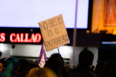 MADRID, SPAIN - MARCH 8, 2019: Massive feminist protest on 8M in favour of women's rights and equality in society. Protest posters could be seen during the demonstration, in Madrid, Spain on March 8, 