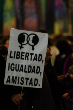 MADRID, SPAIN - MARCH 8, 2019: Massive feminist protest on 8M in favour of women's rights and equality in society. Protest posters could be seen during the demonstration, in Madrid, Spain on March 8, 