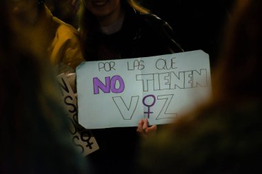 MADRID, SPAIN - MARCH 8, 2019: Massive feminist protest on 8M in favour of women's rights and equality in society. Protest posters could be seen during the demonstration, in Madrid, Spain on March 8, 