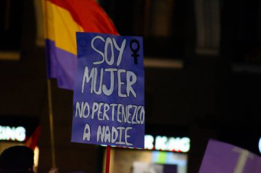 MADRID, SPAIN - MARCH 8, 2019: Massive feminist protest on 8M in favour of women's rights and equality in society. Protest posters could be seen during the demonstration, in Madrid, Spain on March 8, 