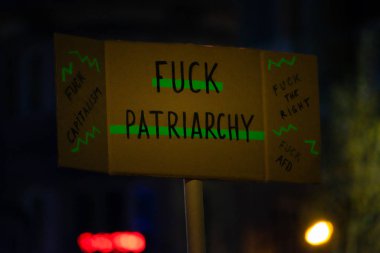 MADRID, SPAIN - MARCH 8, 2019: Massive feminist protest on 8M in favour of women's rights and equality in society. Protest posters could be seen during the demonstration, in Madrid, Spain on March 8, 