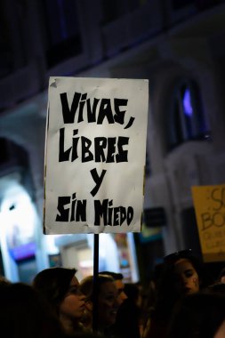 MADRID, SPAIN - MARCH 8, 2019: Massive feminist protest on 8M in favour of women's rights and equality in society. Protest posters could be seen during the demonstration, in Madrid, Spain on March 8, 