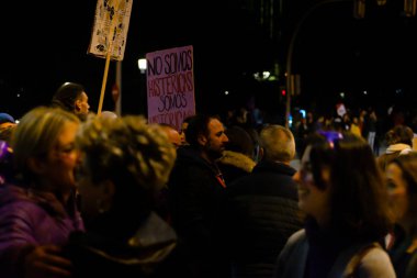 MADRID, SPAIN - MARCH 8, 2019: Massive feminist protest on 8M in favour of women's rights and equality in society. Protest posters could be seen during the demonstration, in Madrid, Spain on March 8, 