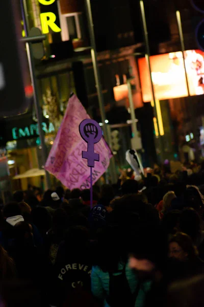 MADRID, SPAIN - MARCH 8, 2019: Massive feminist protest on 8M in favour of women's rights and equality in society. Protest posters could be seen during the demonstration, in Madrid, Spain on March 8, — Stok fotoğraf