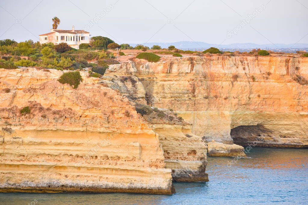 Small summer house on top of the cliffs, overlooking the sea. Algarve, Portugal