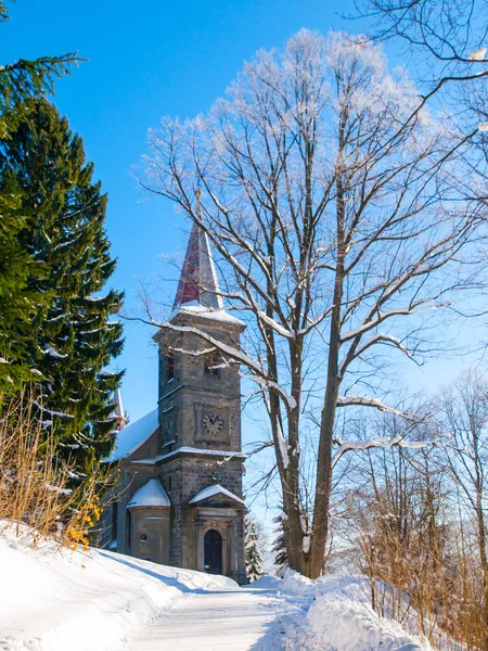 Rural church in winter time, Horni Tanvald, Northern Bohemia, Czech Republic, Europe — Stock Photo, Image