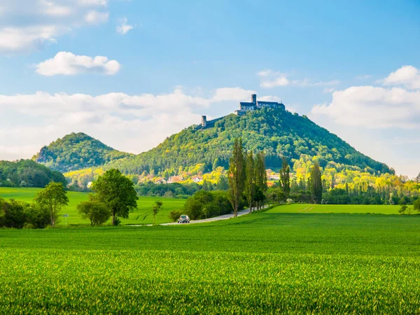 Medieval castle Bezdez on the mountain top. Sunny summer day with lush green fields in Czech landscape. Czech Republic — Stock Photo, Image