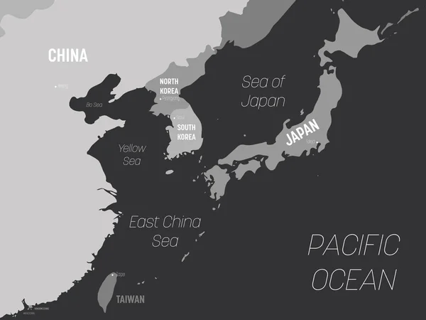 Carte d'Asie de l'Est - couleur grise sur fond sombre. Carte politique détaillée de la région orientale avec l'étiquetage des noms de pays, de capitale, d'océan et de mer — Image vectorielle