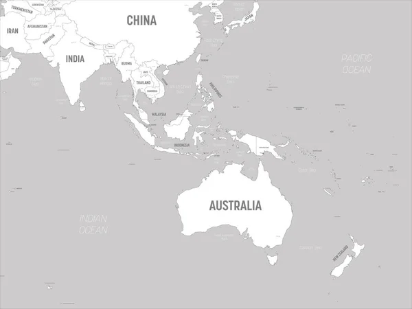 Mapa da Austrália e Sudeste Asiático - terras brancas e águas cinzentas. Mapa político detalhado da região australiana e sudeste da Ásia com nomes de países, capitais, oceanos e mares rotulados — Vetor de Stock