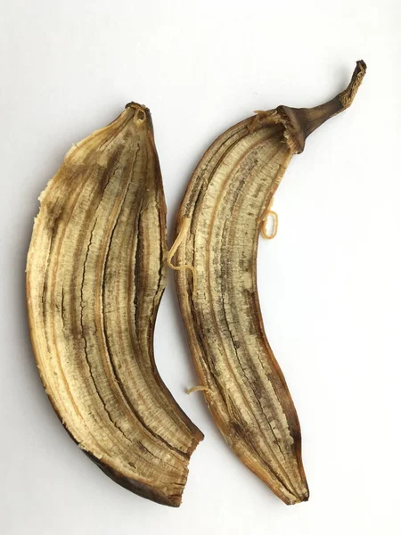 白地にバナナの皮が近い 抽象化 最小限の構成 — ストック写真